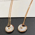 [BIJOUX]COLLIER MOP AMULETTE OR ROSE
