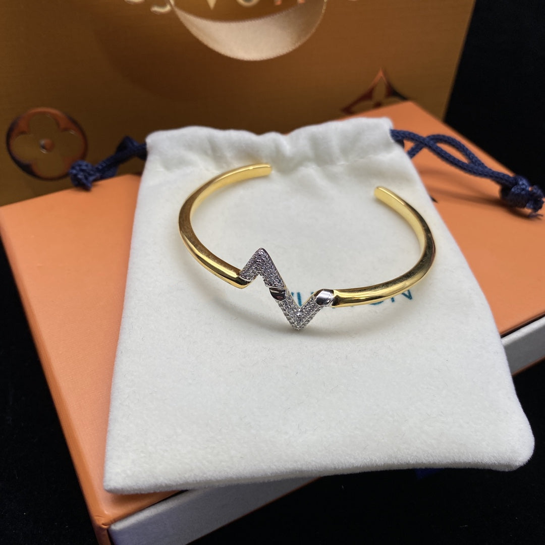 [BIJOUX]BRACELET OUVERT EN OR DIAMANT VOLTE UPITE DOWN