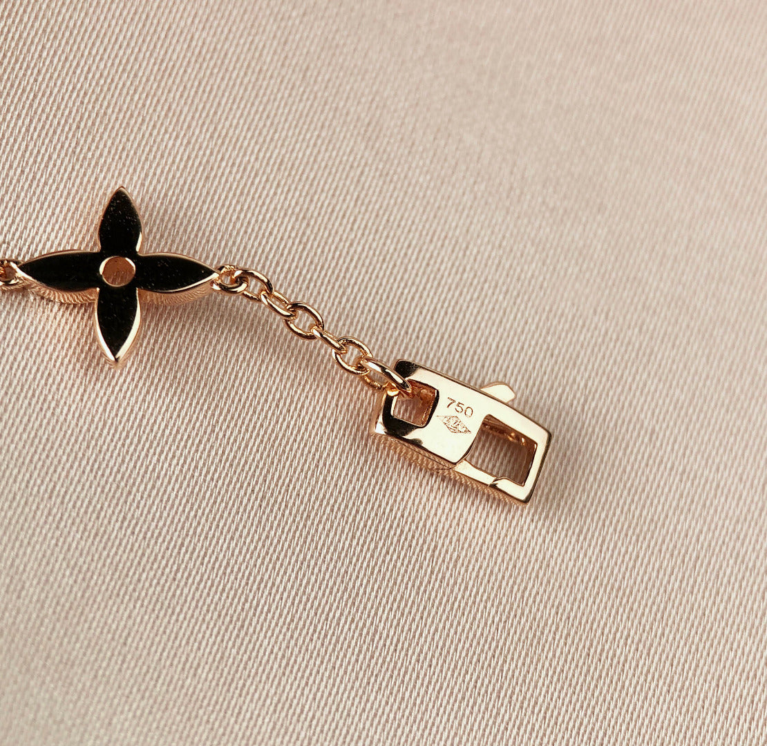 [BIJOUX]BRACELET EN OR 7 MOTIFS ÉTOILE ET SOLEIL