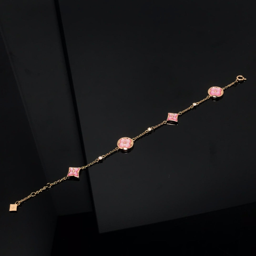 [BIJOUX]BRACELET OR ROSE NACRE ROSE 4 MOTIFS ÉTOILE ET SOLEIL