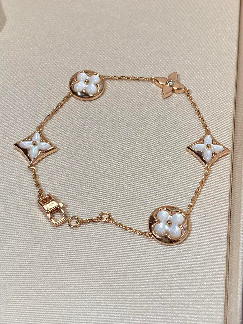 [BIJOUX]STAR AND SUN 5 MOTIF MOP PINK GOLD BRACELET