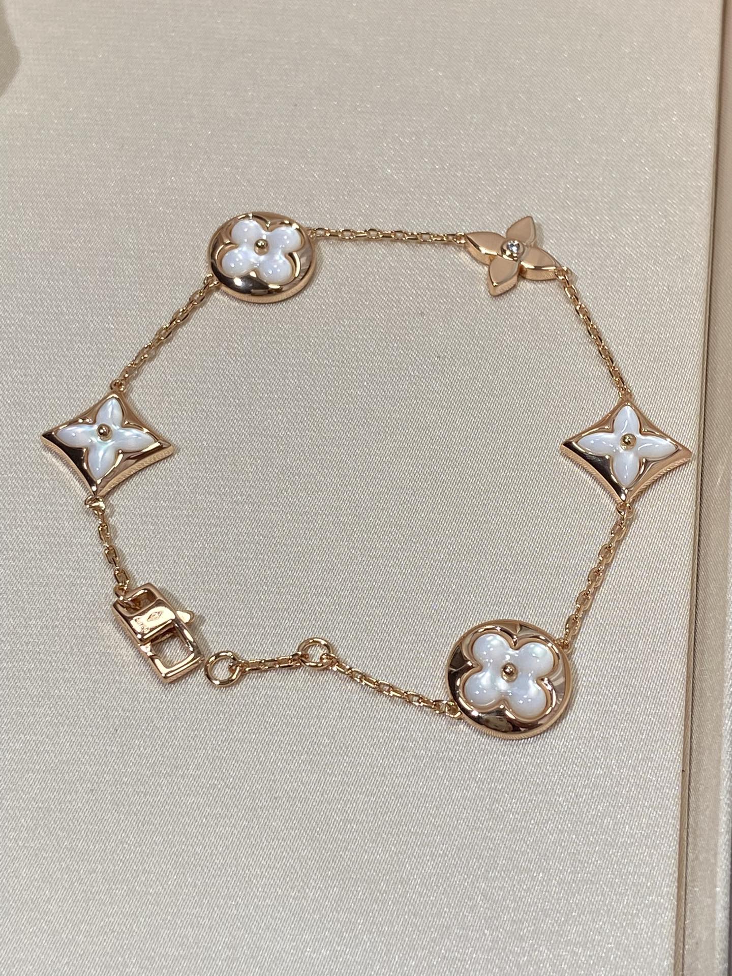 [BIJOUX]STAR AND SUN 5 MOTIF MOP PINK GOLD BRACELET