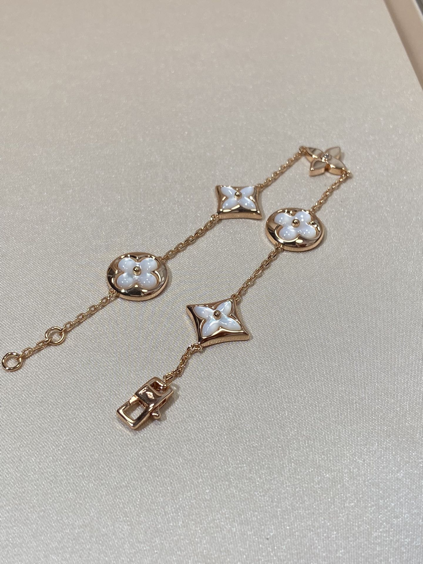 [BIJOUX]STAR AND SUN 5 MOTIF MOP PINK GOLD BRACELET