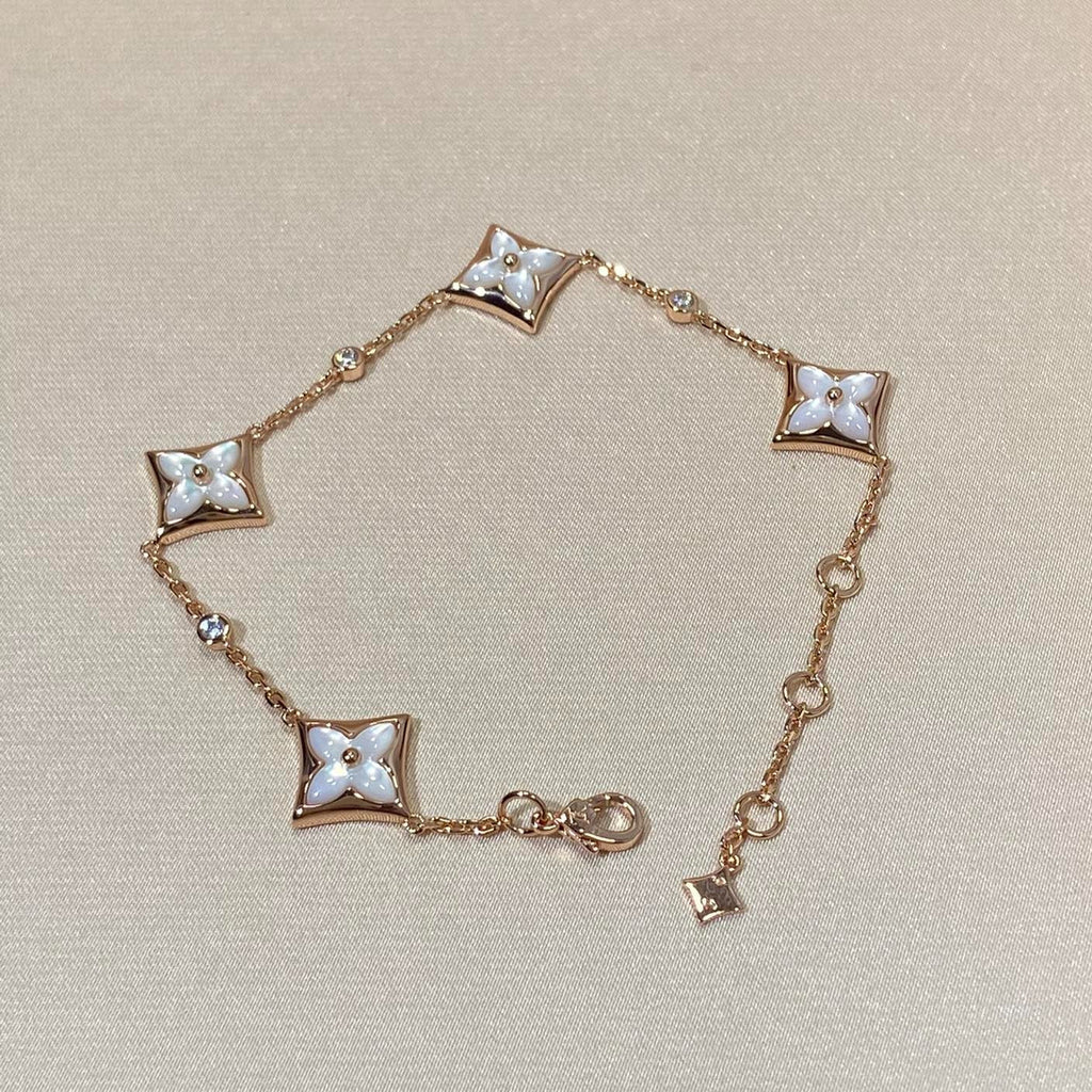 [BIJOUX]BRACELET EN OR ROSE DIAMANT ETOILES 4 MOTIFS