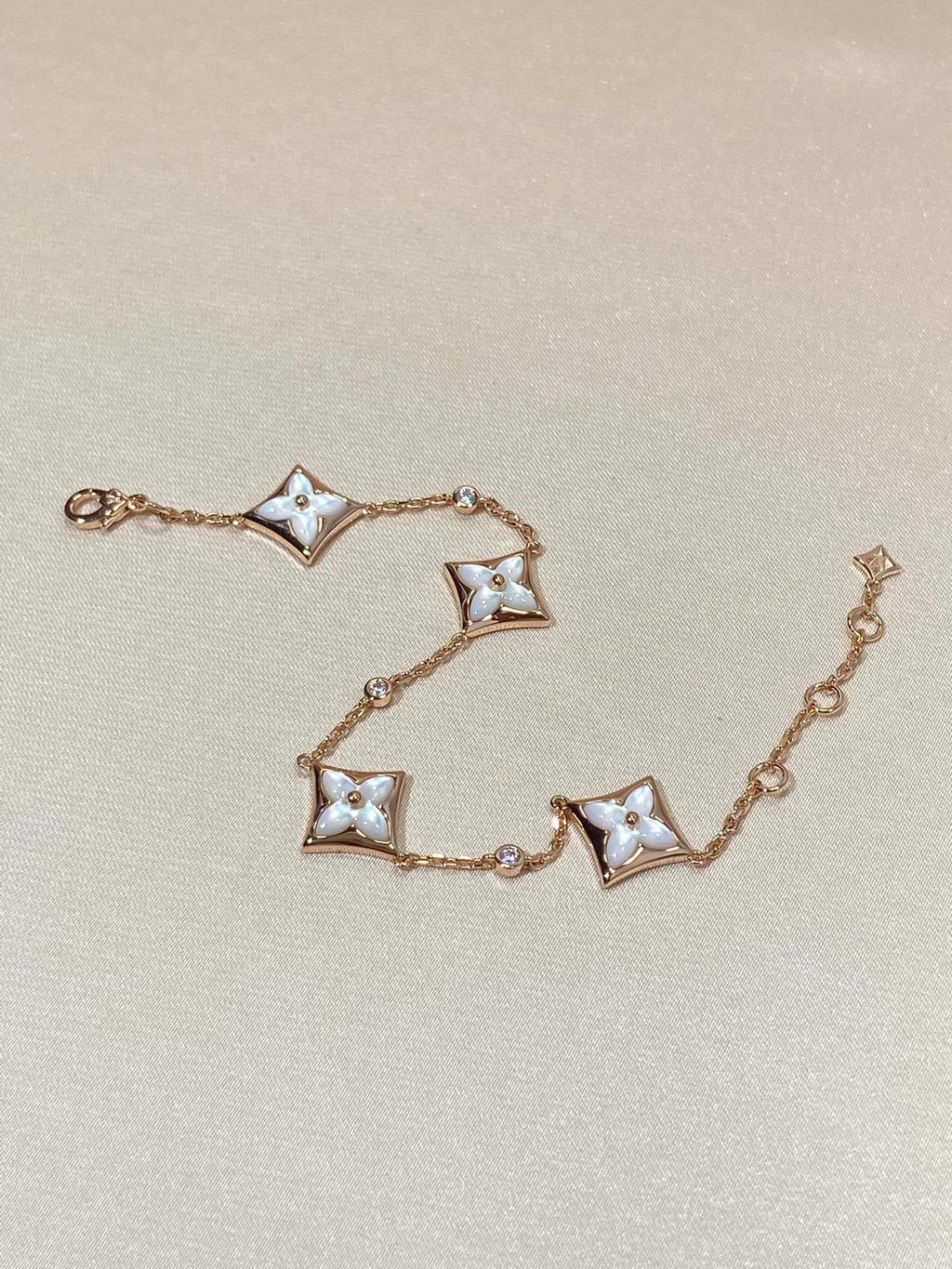 [BIJOUX]BRACELET EN OR ROSE DIAMANT ETOILES 4 MOTIFS