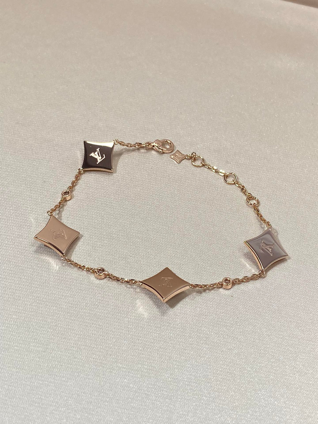 [BIJOUX]BRACELET EN OR ROSE DIAMANT ETOILES 4 MOTIFS