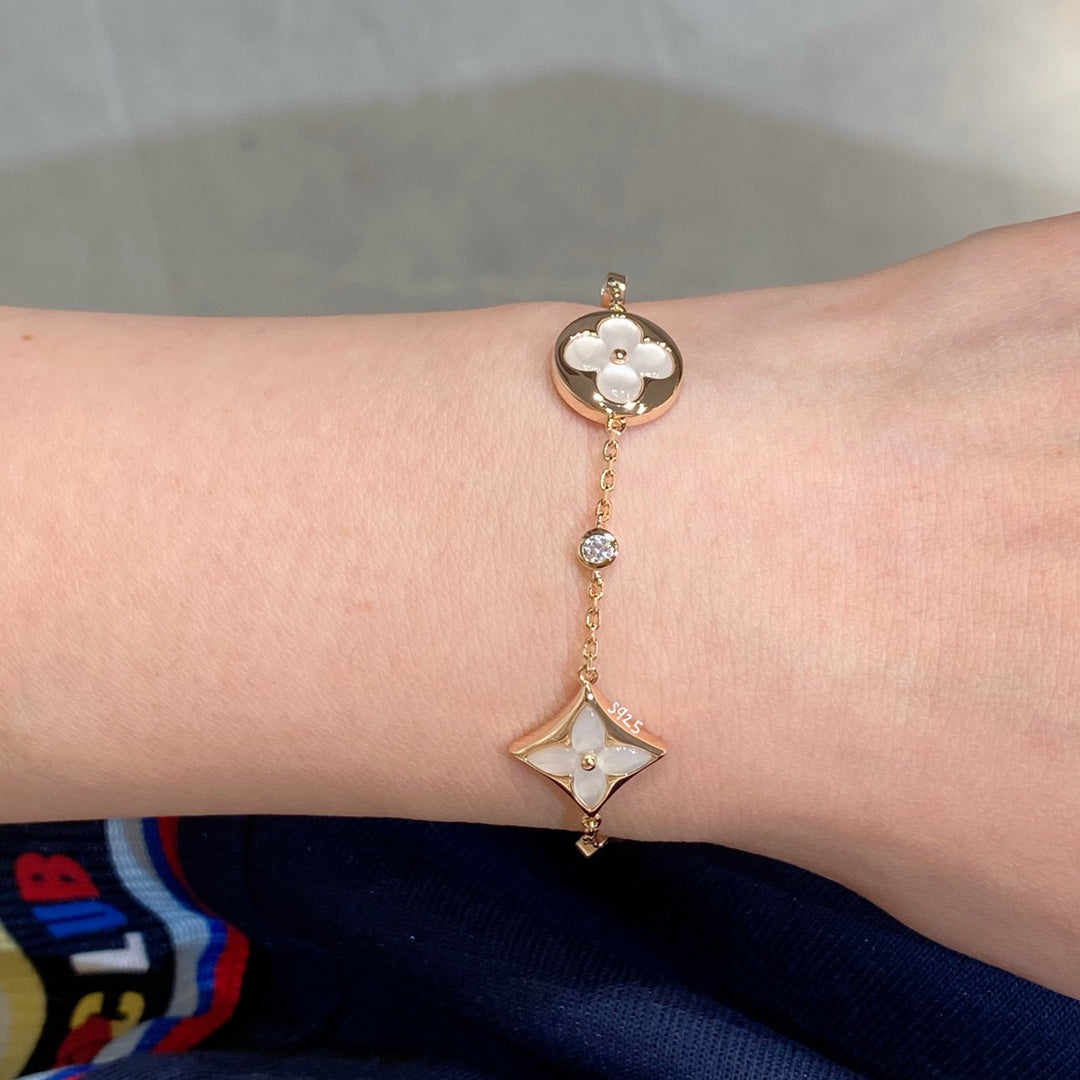 [BIJOUX]STAR AND SUN 4 MOTIF WHITE MOP PINK GOLD BRACELET