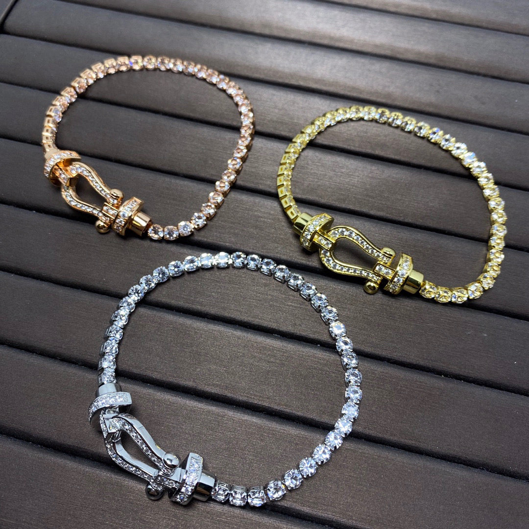 [BIJOUX]BRACELET TENNIS FORCE FER À CHEVAL DIAMANT