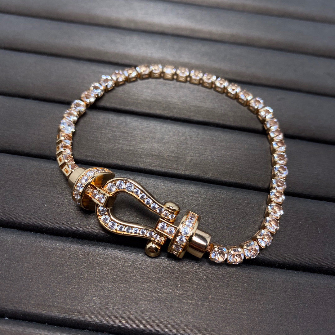 [BIJOUX]BRACELET TENNIS FORCE FER À CHEVAL DIAMANT