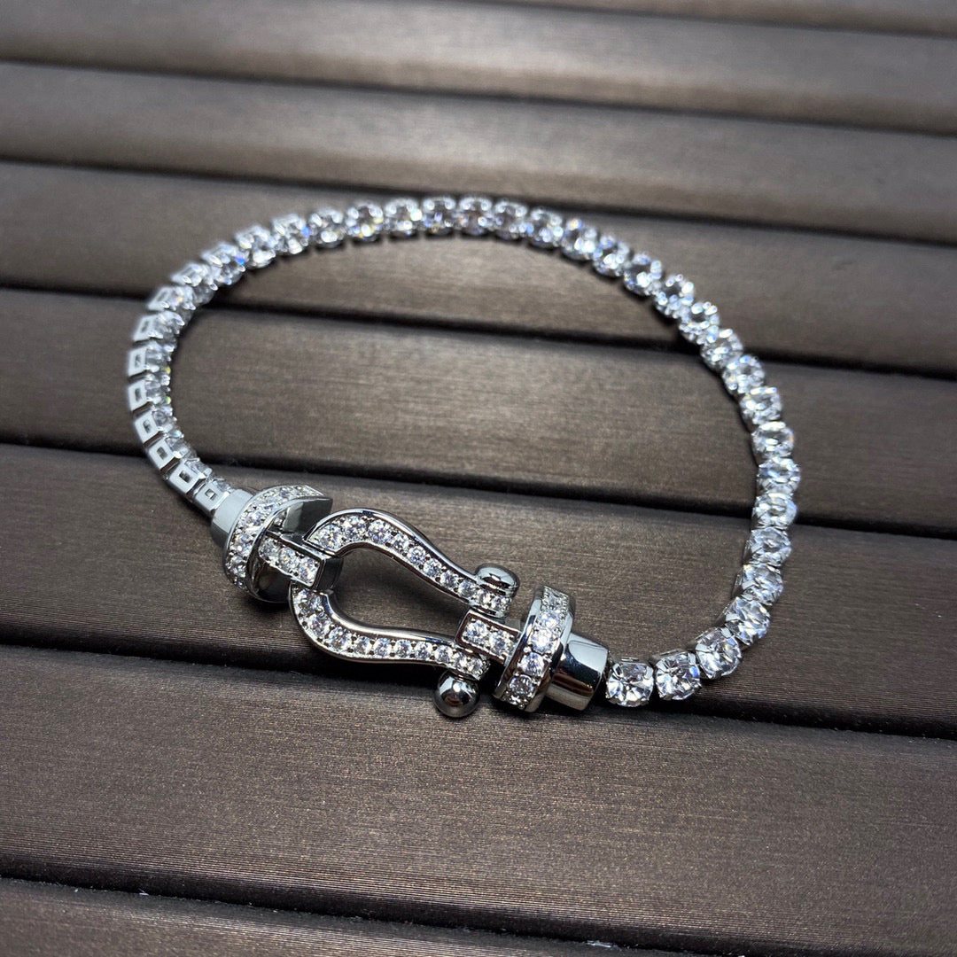 [BIJOUX]BRACELET TENNIS FORCE FER À CHEVAL DIAMANT