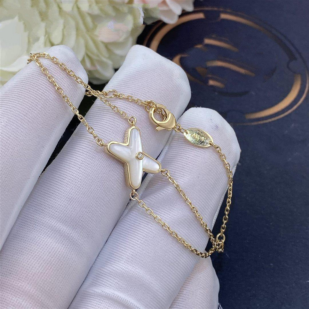 [BIJOUX]JEUX BRACELET NACRE BLANC OR 1 DIAMANT