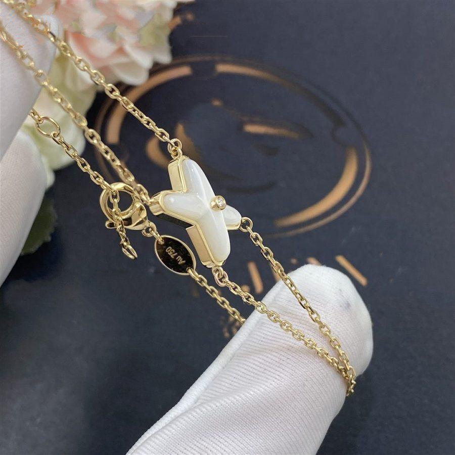[BIJOUX]JEUX BRACELET NACRE BLANC OR 1 DIAMANT