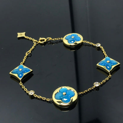 [BIJOUX]BRACELET 4 MOTIFS ÉTOILE ET SOLEIL BLEU