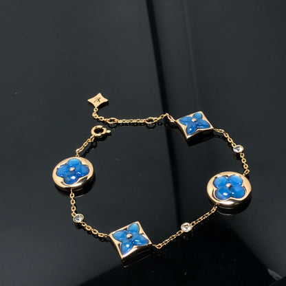 [BIJOUX]BRACELET 4 MOTIFS ÉTOILE ET SOLEIL BLEU